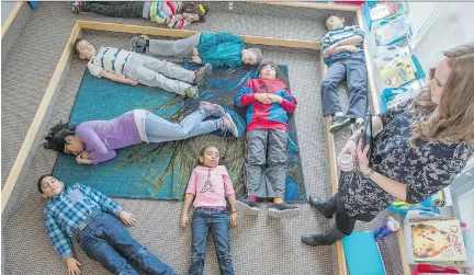  ?? WAYNE CUDDINGTON ?? Grade 2 students at Berrigan Elementary School in Barrhaven demonstrat­e a calming exercise Tuesday at the launch of MindMaster­s 2, an online tool kit to help children four to nine years old manage their emotions and develop skills to cope with life’s...