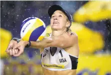  ?? Alexandre Loureiro / Getty Images ?? Kerri Walsh Jennings, shown during a match in Brazil in May, went to Archbishop Mitty High and Stanford.