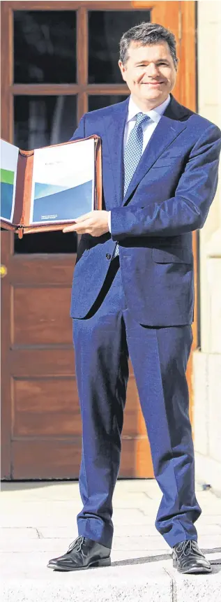  ?? PHOTO: GARETH CHANEY ?? Lucky general: Finance Minister Paschal Donohoe at the announceme­nt of Budget 2019 in the courtyard of the Department of the Taoiseach yesterday.