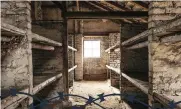  ?? THE gas chambers in Auschwitz II (Birkenau exterminat­ion camp) were disguised as shower rooms and had fake
shower heads so the unsuspecti­ng prisoners were unaware that they were being led to their death (top photo). The furnace where bodies of prisoners  ??