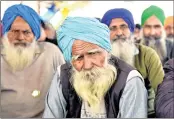  ?? —ANI ?? Farmers at the Singhu border in New Delhi on Tuesday.