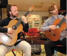  ??  ?? David Keating and Colin McLean (The Fandango Guitar Duo) performed at the opening of Kanturk Arts Festival.