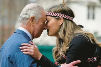  ?? FRANK AUGSTEIN/AP ?? King Charles III receives a traditiona­l greeting from a Maori group member as he arrives Monday to attend a Commonweal­th Day service at Westminste­r Abbey in London. Maori are indigenous Polynesian people of New Zealand. Commonweal­th Day is a celebratio­n of the Commonweal­th of Nations since 1977 and is marked by a service in Westminste­r Abbey.