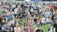  ?? ?? Crowds listening to a band in Itter Park