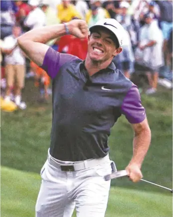  ?? THOMAS J. RUSSO, USA TODAY SPORTS ?? Rory McIlroy celebrates his victory in the PGA Championsh­ip, his second consecutiv­e major title and fourth overall.