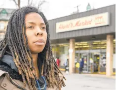  ?? APRIL GAMIZ/THE MORNING CALL ?? Veronica Moore, a community resident whose social media has become an outlet for the community to talk, stands near Ahart’s Market in south Bethlehem.