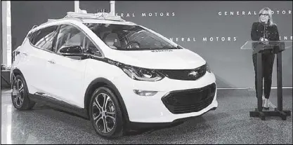  ??  ?? General Motors chairperso­n and CEO Mary Barra unveils the 2017 Chevrolet Bolt EV last Dec. 15.