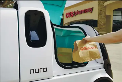  ?? NATHAN LINDSTROM FOR NURO ?? CVS Health says that if their program using Nuro autonomous cars is successful in a Houston-area trial, customers can soon expect to get medication­s and other products within an hour of ordering.