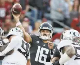  ?? Young Kwak / Associated Press ?? Washington State quarterbac­k Gardner Minshew threw for four touchdowns against Oregon. The No. 14 Cougars play at No. 24 Stanford on Saturday.