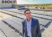  ?? ?? Chavez, shown amid solar panels on the administra­tion building at Holt Cat, says improved energy storage capacity is needed.