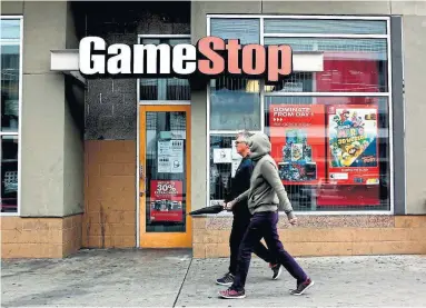  ?? DANIA MAXWELL TRIBUNE NEWS SERVICE FILE PHOTO ?? Day traders are now paying the price as GameStop shares (purchased at unnatural highs) come back to Earth.