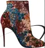  ??  ?? Boots Dh3,459, Christian Louboutin at Tryano