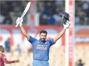  ?? — AFP photo ?? India cricketer Rohit Sharma was one of two on his team to score a century and set the West Indies a tough ODI challenge.