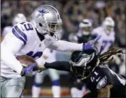  ?? MATT ROURKE — THE ASSOCIATED PRESS ?? Eagles’ cornerback Ronald Darby tries to tackle Cowboys’ wide receiver Amari Cooper during the first half of Sunday night’s game. Darby suffered a torn ACL in the 27-20 loss.