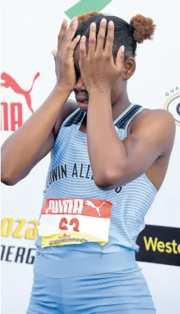  ?? FILE ?? A dejected Tina Clayton, despite her victory in the Class Two Girls 100m final on Thursday. Clayton was disappoint­ed that her twin sister Tia, who says the 100m is her favourite race, had a false start.