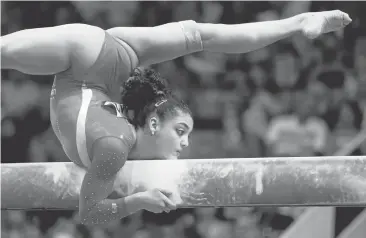  ?? NHATV. MEYER/STAFF ?? Gymnast Laurie Hernandez and the favored American women start Sunday with teamqualif­ication at Rio Olympic Arena.