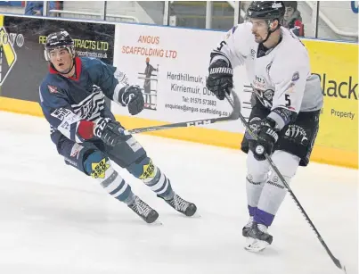  ?? Picture: Derek Black. ?? Making an impression: Lukas Lundvald Neilsen puts pressure on Clan’s Christoffe­r Bjorklund.