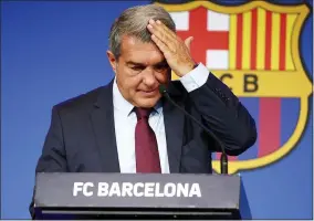  ?? JOAN MONFORT - THE ASSOCIATED PRESS ?? FC Barcelona club President Joan Laporta begins a news conference in Barcelona, Spain, Friday, Aug. 6, 2021.