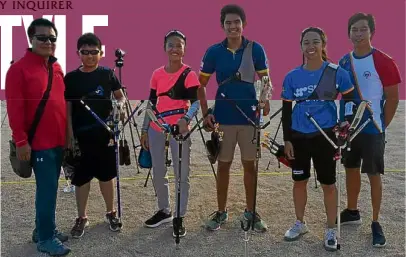  ??  ?? The author (third from left) with fellow archers and coaches in Cebu