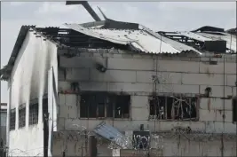  ?? THE ASSOCIATED PRESS ?? In this photo taken from video a view is shown of a destroyed barracks at a prison in Olenivka, Ukraine, in an area