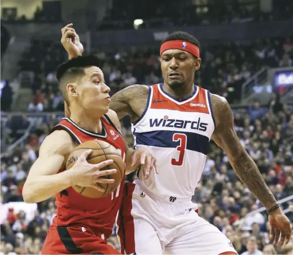  ?? Veronica Henri ?? Raptors guard Jeremy Lin works his way past Washington Wizards guard Bradley Beal at Scotiabank Arena in Toronto on Wednesday.