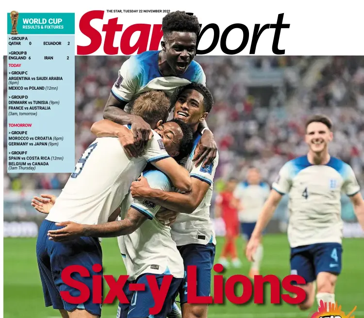  ?? — AP ?? Roaring start: England’s Raheem Sterling (centre) is hugged by (from left) Harry Kane, Bukayo Saka and Jude Bellingham after scoring the third goal against Iran.