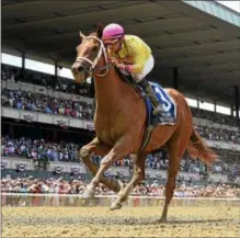  ?? PHOTO NYRA ?? Monomy Girl with jockey Florent Geroux aboard captured the Grade 1 Acorn Stakes at Belmont on June 9.