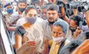  ??  ?? CCB officials take Kannada actress Ragini Dwivedi for questionin­g in Bengaluru on Friday.