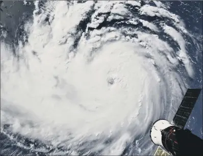  ??  ?? Hurricane Florence seen from the Internatio­nal Space Station as it threatens the US East Coast.