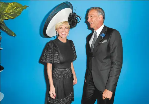  ??  ?? Julie Bishop and friend David Panton at Victoria Derby Day in Melbourne.