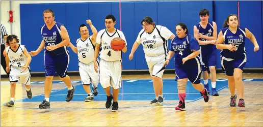  ?? Photos by Ernest A. Brown ?? The Burrillvil­le Unified basketball team advanced to Sunday’s Division 6 title game at Hendricken after defeating Scituate, 57-42. The Broncos received 19 points from 19 points from Jordan DaSilva (4), while Jarred Lipka (22) attempts a shot. As coach...