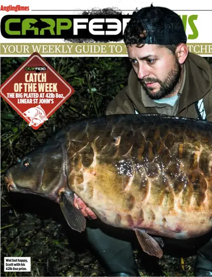  ??  ?? Wet but happy, Scott with his 42lb 8oz prize.