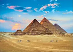  ??  ?? HIGH POINTS The pyramids in Egypt remain one of the quintessen­tial sights