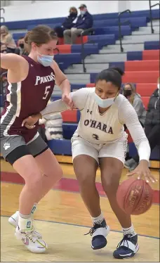  ?? MEDIANEWS GROUP FILE PHOTO ?? Cardinal O’Hara’s Amaris Baker dribbles past Bonner-Prendie’s Bridie McCann in a game earlier in this month. Baker scored 11 points on Saturday to help lead O’Hara knock off Archbishop Carroll, 55-37.