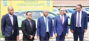  ?? ?? SNG Grant Thornton’s Managing Director for Advisory Services Oupa Mbokodo (L) poses for a picture with Minister of Tourism and Environmen­t Affairs Moses Vilakati (c) Prime Minister Cleopas Dlamini (2nd R) and other SNG staff.