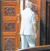  ?? PTI FILE ?? BS Yeddyurapp­a leaves the assembly hall at the Vidhana Soudha after resigning as the chief minister on Saturday.