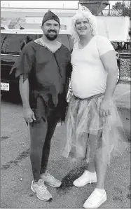  ?? PHOTO SUBMITTED ?? Kenny Blue and John Lucas show off the wearing of the green in a previous race, the Berry Glow Run. Organizers for the second annual Trailblaze­r are encouragin­g participan­ts to ‘green it up’ on Saturday.