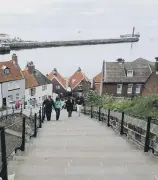  ??  ?? VIEW TO A THRILL: The famous 199 steps overlookin­g the harbour, which will be playing host to the Whitby Regatta from August 14 to 17.