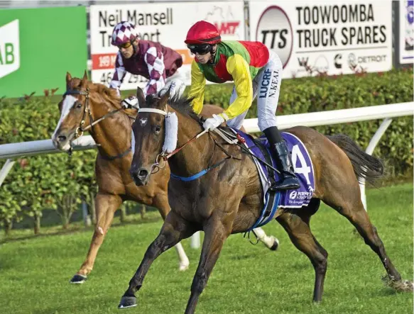  ?? Photo: Kevin Farmer ?? GOOD WIN: King’s Lady (outside) completes her Maiden Handicap victory at Clifford Park yesterday for apprentice Nick Keal.