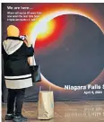  ?? ?? A Nasa countdown display at Niagara Falls, New York ticks down to the eclipse