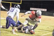  ?? Contribute­d by Gail Conner ?? Cedartown’s Jayden Johnson scrambles out of bounds during a game against Chapel Hill last season. The rising senior committed to South Carolina last week.