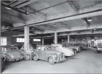 ??  ?? Austin A40 cars in the body shop of Fred Deeley Motors in the early 1950s. At one point the dealership sold one out of every three Austins in British Columbia.