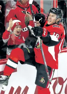  ?? FRED CHARTRAND/THE CANADIAN PRESS ?? Ottawa’s Ryan Dzingel celebrates his goal during the Senators’ 6-5 overtime win over the San Jose Sharks last Friday in Ottawa.