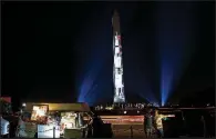  ?? AP/JOSE LUIS MAGANA ?? A 363-foot Saturn V rocket used in the Apollo 11 mission is projected to scale on the Washington Monument to illustrate its size as part of festivitie­s for the 50th anniversar­y of the Apollo moon landing.