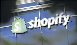  ?? CHRIS WATTIE ■ REUTERS ?? The logo of Shopify is displayed outside its headquarte­rs in Ottawa.