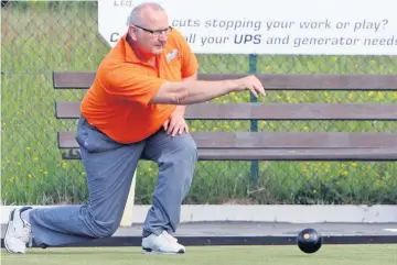  ??  ?? Benllech Bowler Martin Davies in action Picture: Richard Birch