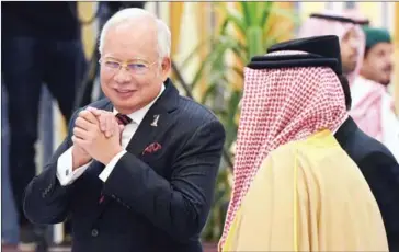  ?? MANDEL NGAN/AFP ?? Malaysia’s Prime Minister Najib Razak arrive for the Arab Islamic American Summit at the King Abdulaziz Conference Centre in Riyadh on May 21.