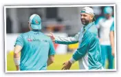  ?? Picture: AFP ?? David Warner and Nathan Lyon share a laugh during an Australian practice session in Galle.