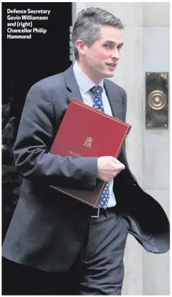  ??  ?? Defence Secretary Gavin Williamson and (right) Chancellor Philip Hammond