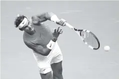  ?? - AFP photo ?? Rafael Nadal of Spain serves during his men’s singles fourth round match against Nikoloz Basilashvi­li of Georgia on Day Seven of the 2018 US Open at the USTA Billie Jean King National Tennis Center on September 2, 2018 in the Flushing neighborho­od of the Queens borough of New York City.